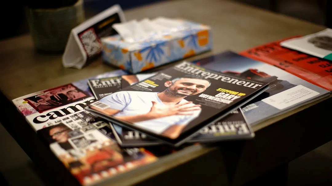 Entrepreneur magazine on top of magazines on table