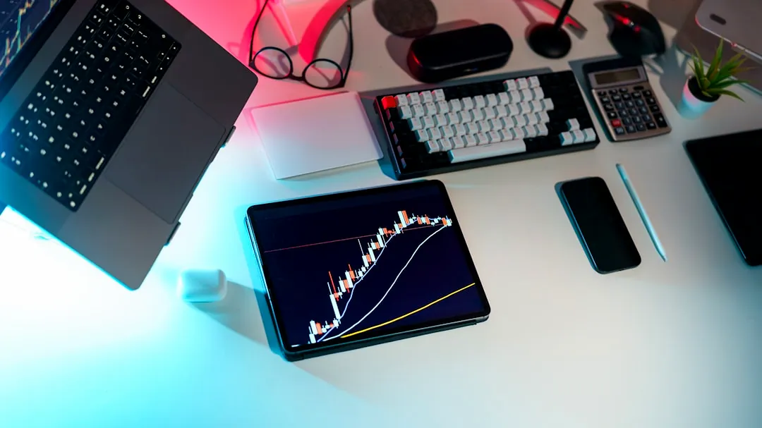 A laptop computer sitting on top of a white desk