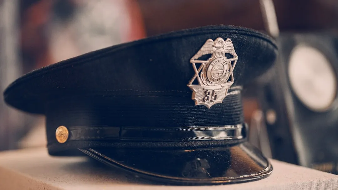 a police hat sitting on top of a box