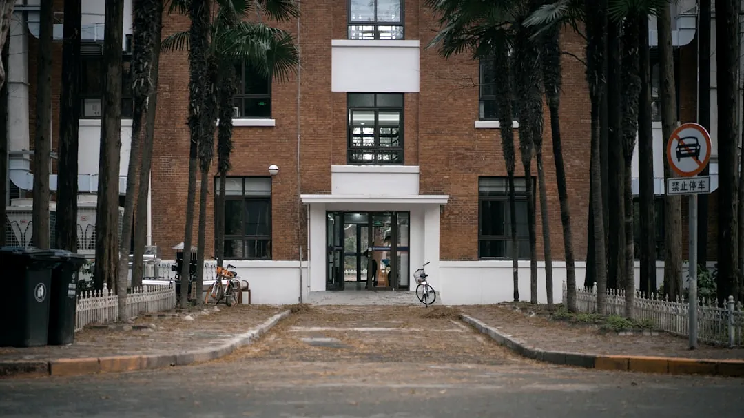 bicycle parked near concrete building