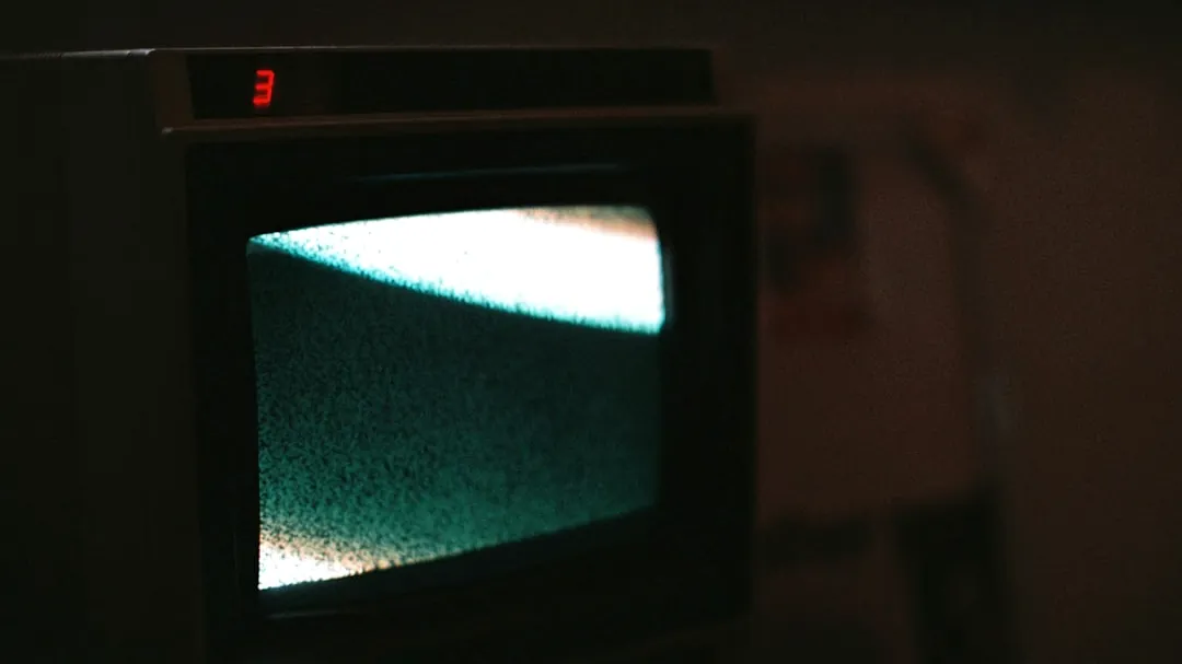 black crt tv turned on showing blue screen