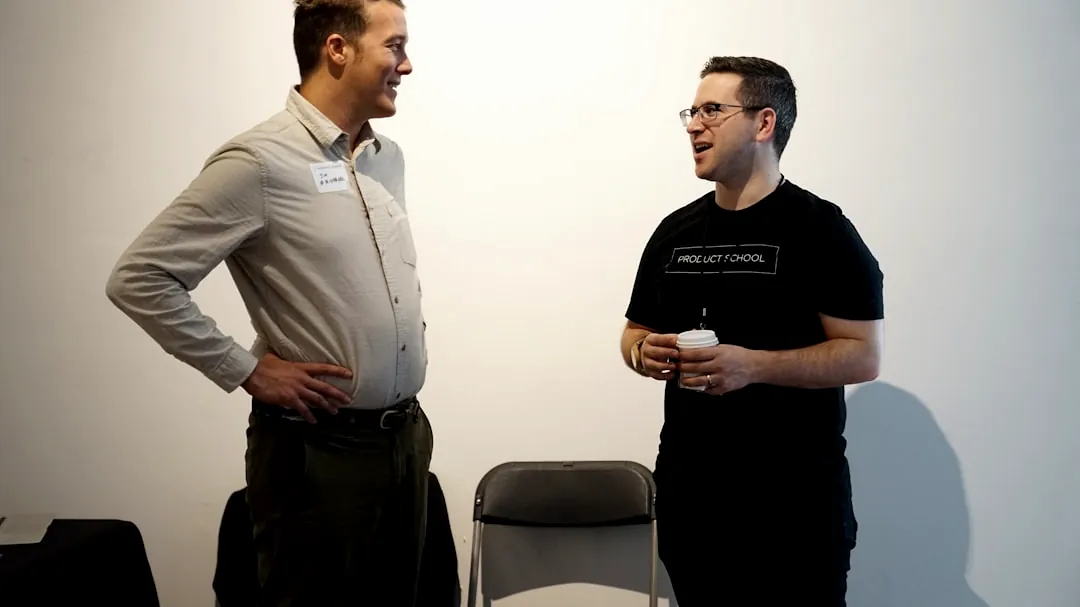 folding chair between two men