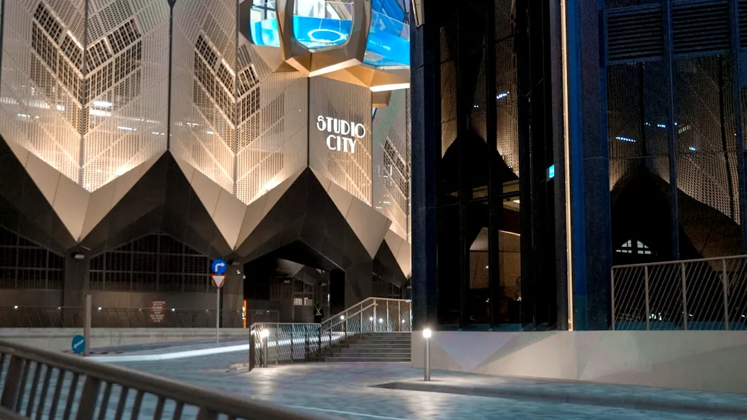 Modern geometric architecture illuminated at night