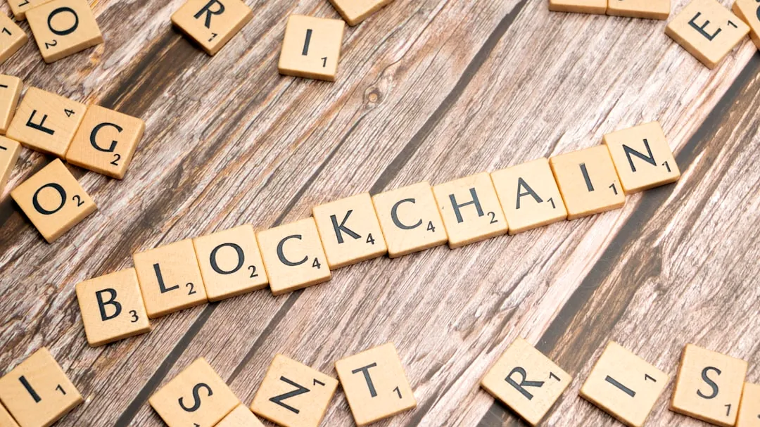 scrabble letters spelling blockchains on a wooden surface